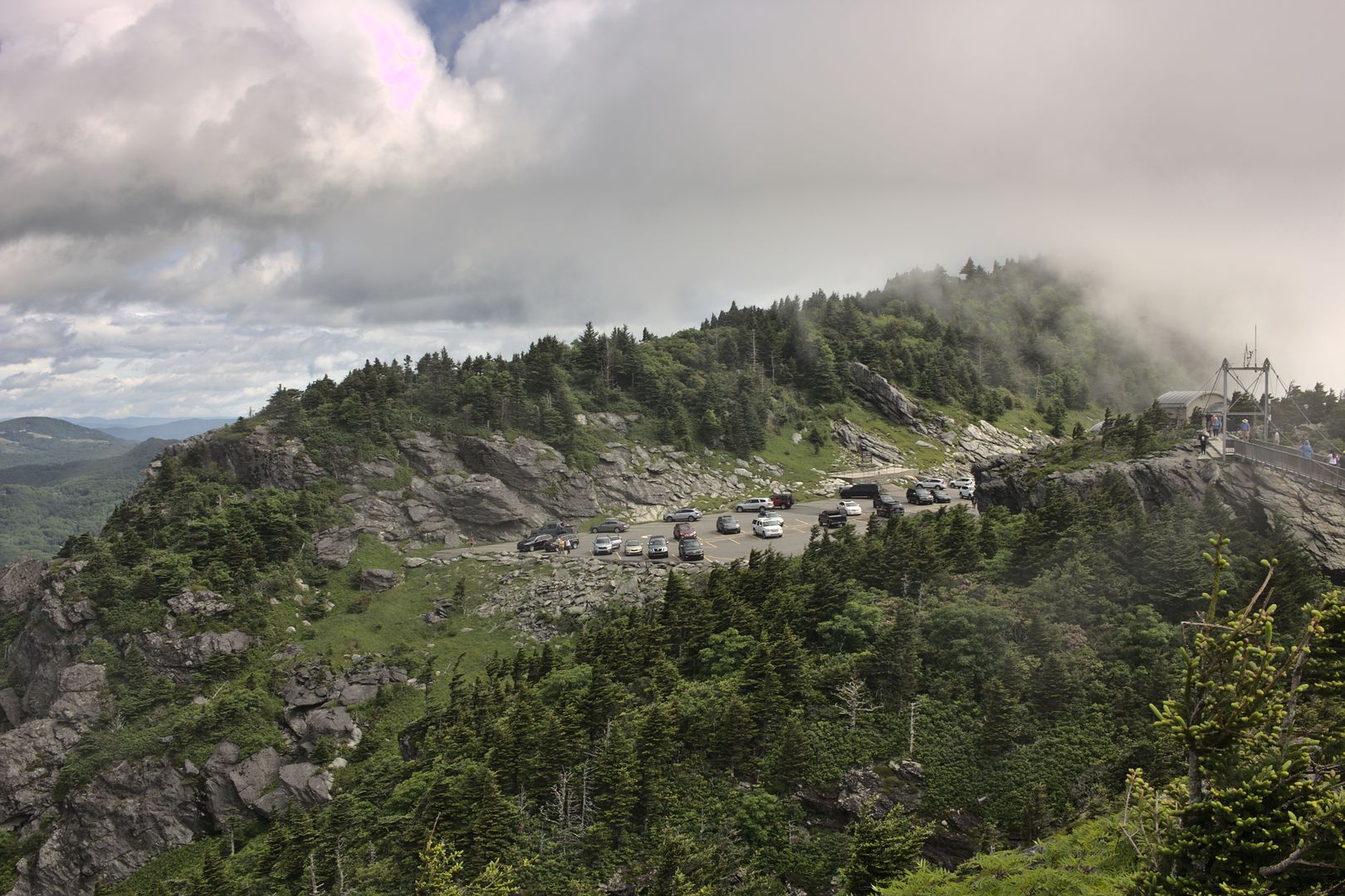 Empty roadside rest area with scenic overlook and parking space